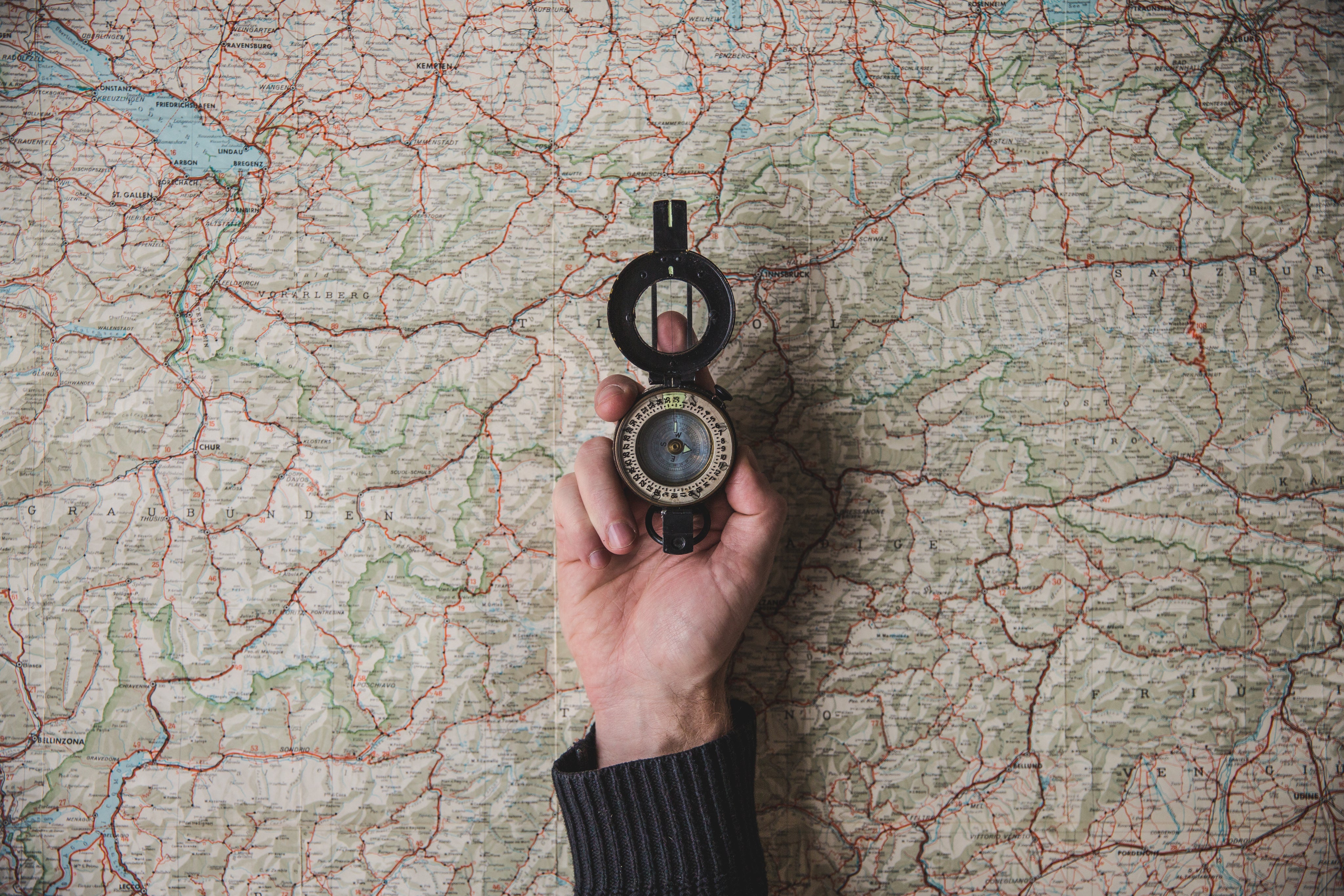 files/compass-held-above-world-map.jpg